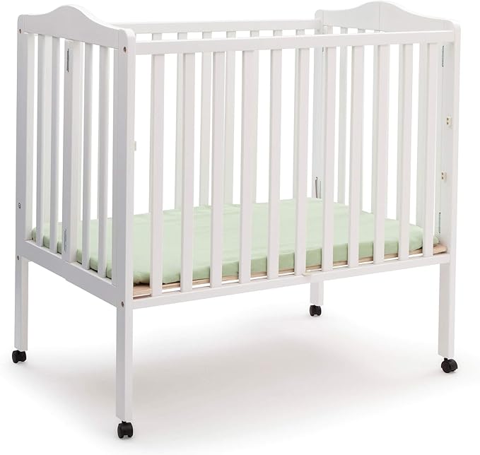 Delta Children Folding Portable Mini Baby Crib with 1.5-inch Mattress - Greenguard Gold Certified,